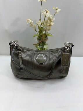 Coach metallic silver hobo bag.